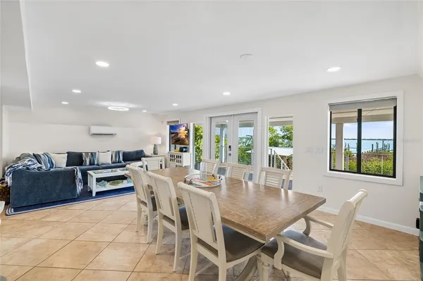 a kitchen with stainless steel appliances kitchen island granite countertop a sink and cabinets
