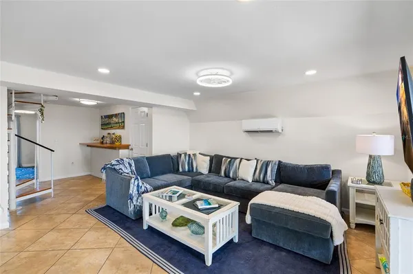 a living room with furniture and a couch