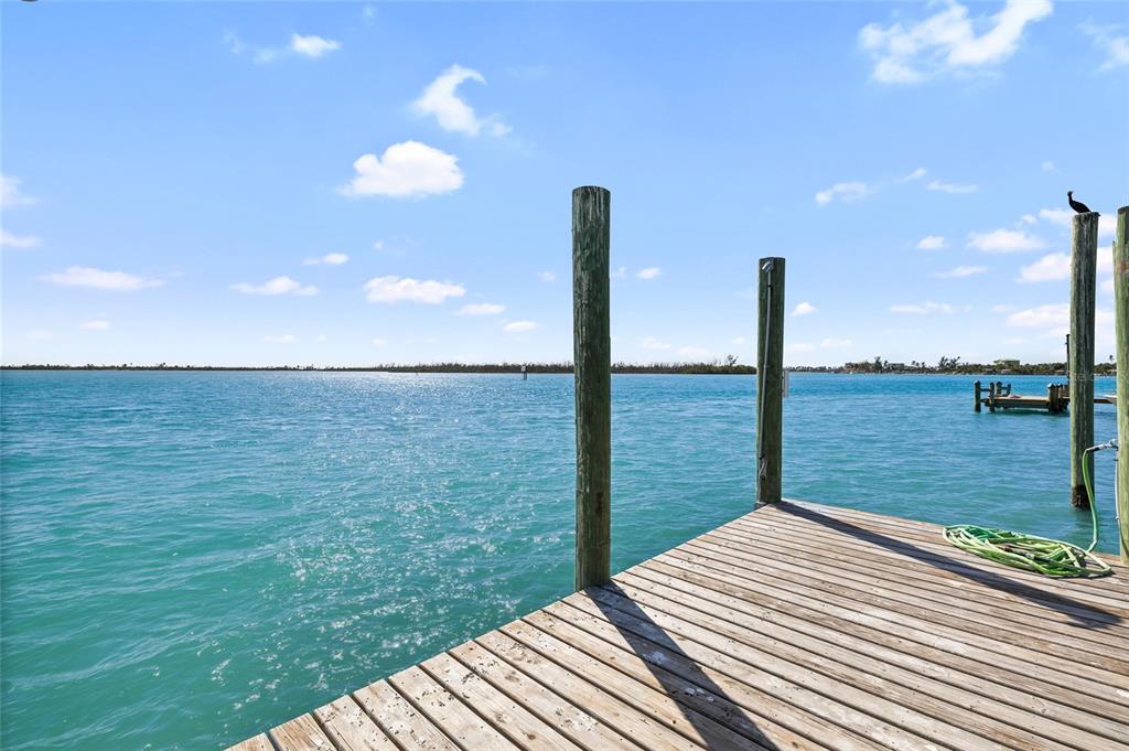9664 Privateer Road Boca Grande, FL 33921 - Photo 40 of 66 a view of a lake with a ocean view