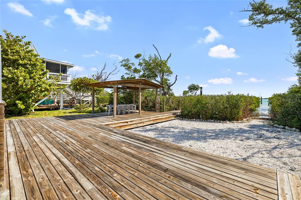 9664 Privateer Road Boca Grande, FL 33921 - Photo 43 of 66 a view of a house with entertaining space
