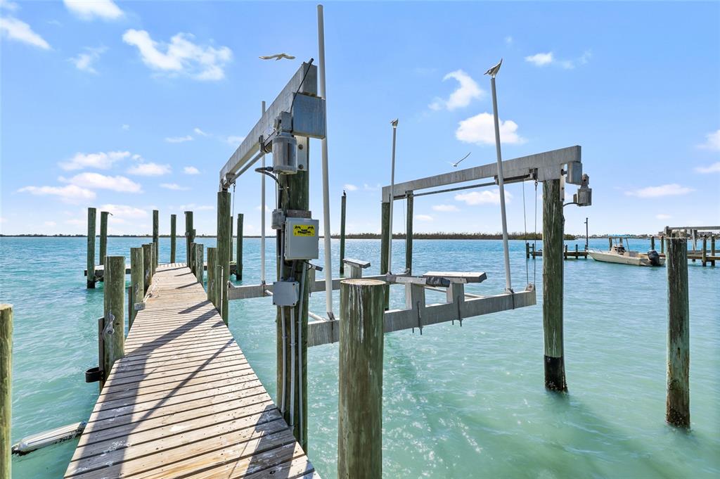 9664 Privateer Road Boca Grande, FL 33921 - Photo 45 of 66 a dinning area with chairs