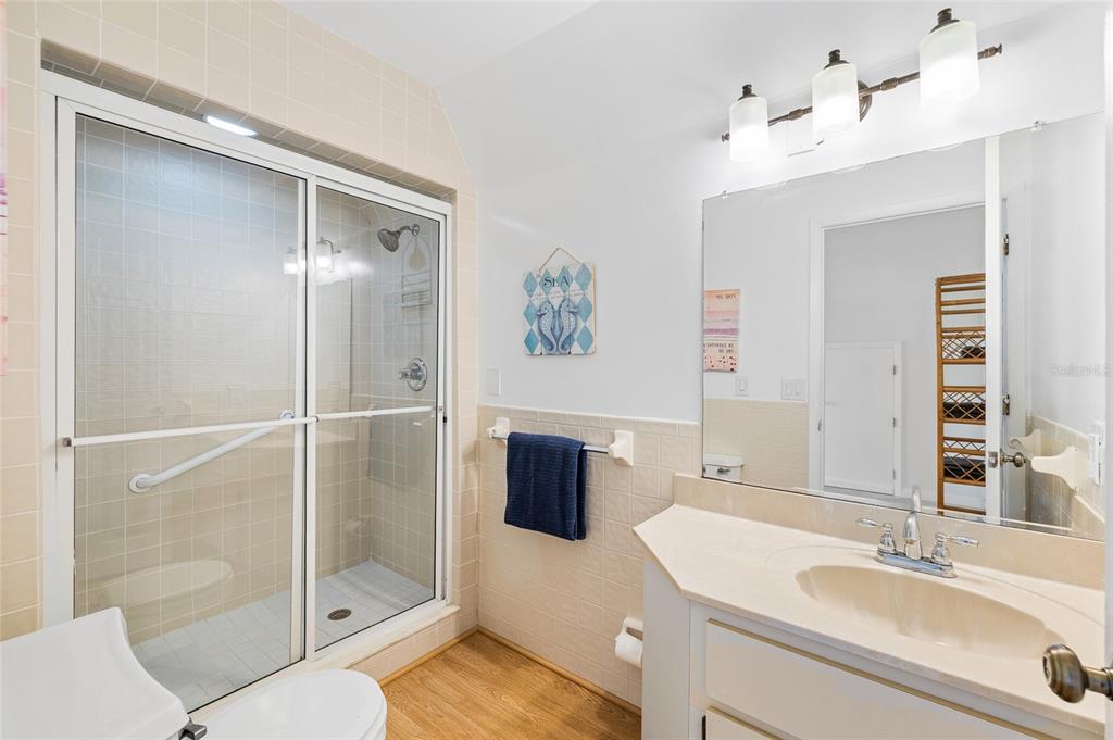 9664 Privateer Road Boca Grande, FL 33921 - Photo 53 of 66 a bathroom with a sink a toilet and shower