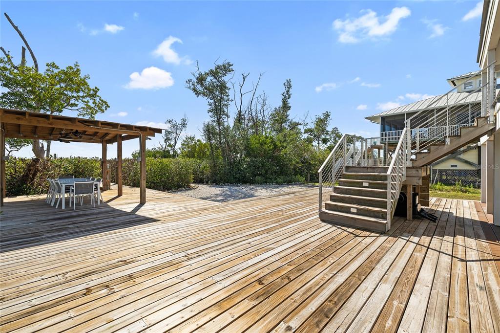 9664 Privateer Road Boca Grande, FL 33921 - Photo 59 of 66 a view of outdoor space and deck