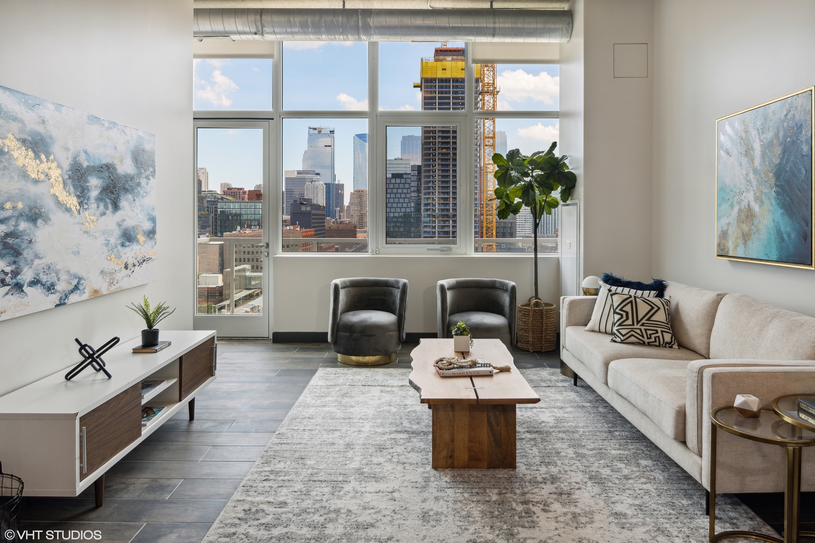 171 North Aberdeen Street, Unit 1008 Chicago, IL 60607 - Photo 2 of 25 a living room with furniture kitchen view and large windows