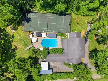a view of swimming pool from a balcony