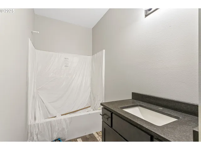 a bathroom with a bathtub