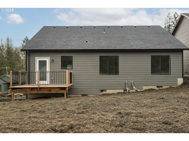 a view of a swimming pool with a yard