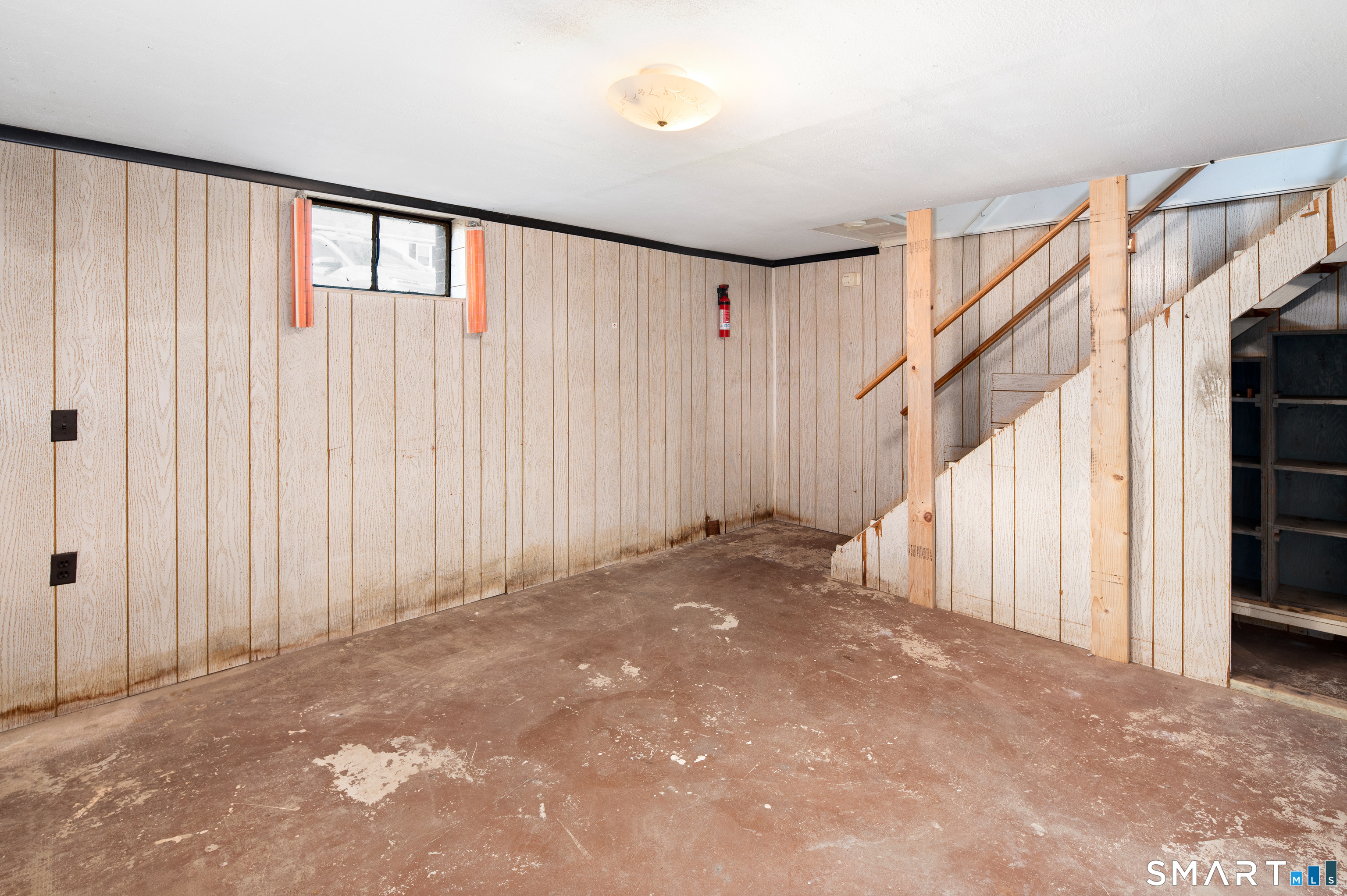 221 Sylvan Knoll Road Stamford, CT 06902 - Photo 19 of 22 a view of an empty room with stairs