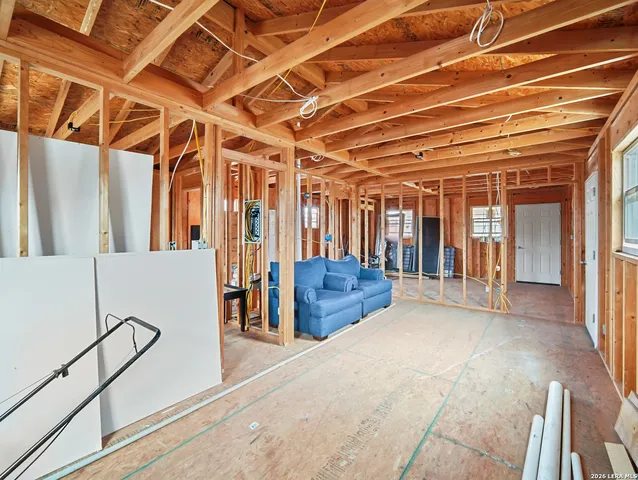 a view of a room with glass door