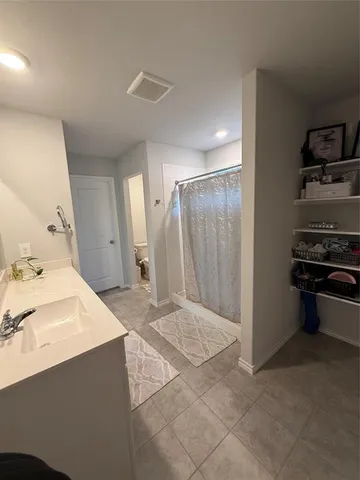 a view of a kitchen with a sink