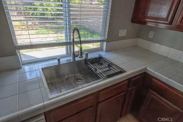 a view of a stove top oven and cabinets