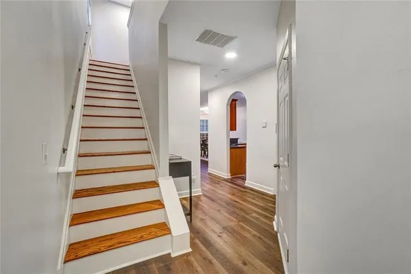 a view of entryway with wooden floor