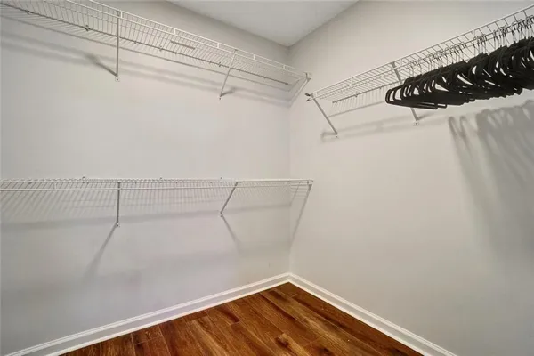 a view of a room with racks on the wall