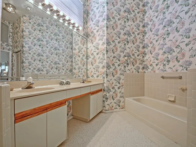 a bathroom with a sink and a bathtub