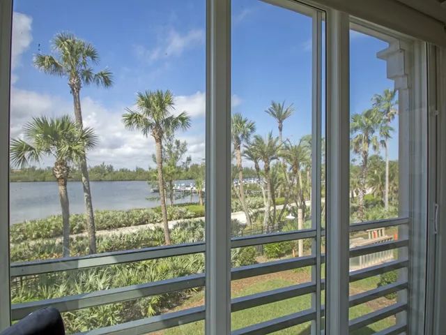 a view of a room with a large window