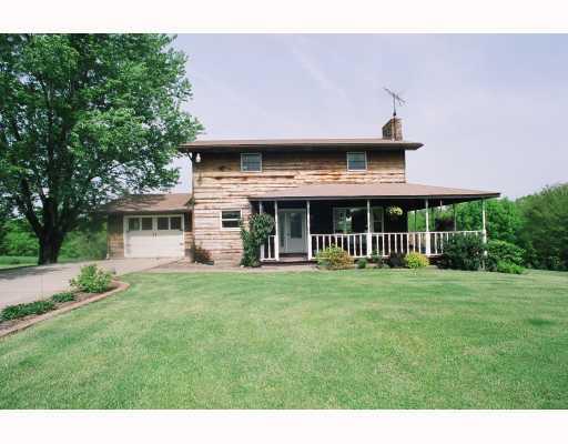 595 Frankfort Road Monaca, PA 15061 - Photo 1 of 16 Exterior Front. 2 story cedar. The exterior was just cleaned & sealed. It has never been stained, only clear coated. Beautiful wrap around covered porch to the back. 1 car attached garage.