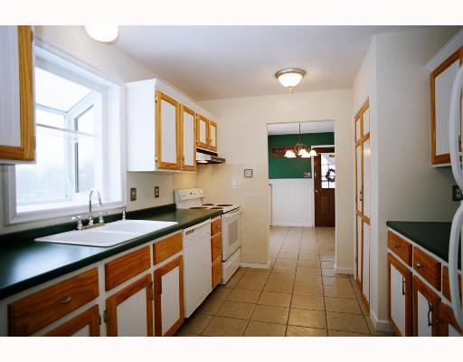 595 Frankfort Road Monaca, PA 15061 - Photo 5 of 16 Kitchen. Solid wood cabinets, all appliances included, new ceramic tile floor through out kitchen, dining room & 1st floor laundry, washer & dryer included.