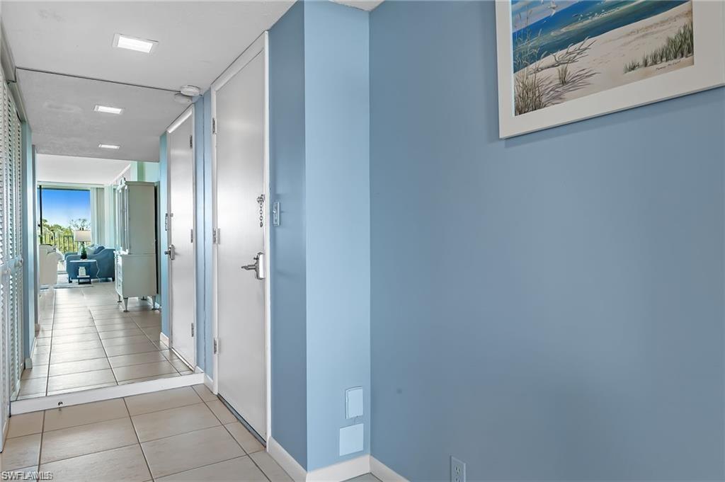 5 Bluebill Avenue, Unit 403 Naples, FL 34108 - Photo 19 of 41 a view of a hallway