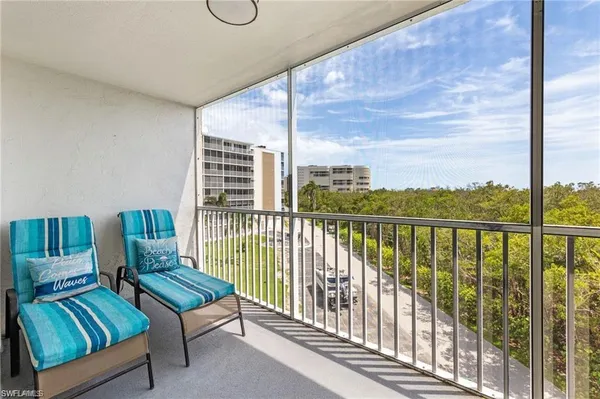a view of a chairs in balcony