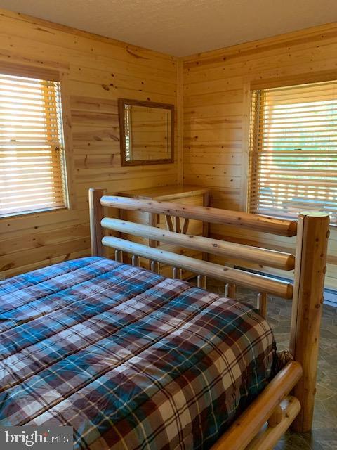 1461 Big Creek Road Clearville, PA 15535 - Photo 126 of 138 a bedroom with a bed and a window