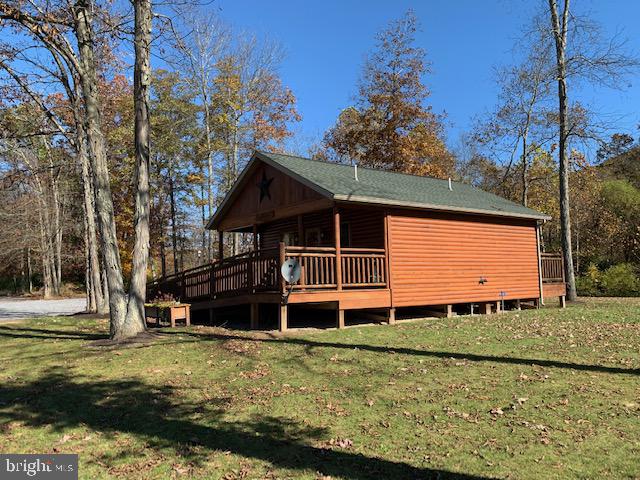 1461 Big Creek Road Clearville, PA 15535 - Photo 133 of 138 a front view of a house with a yard