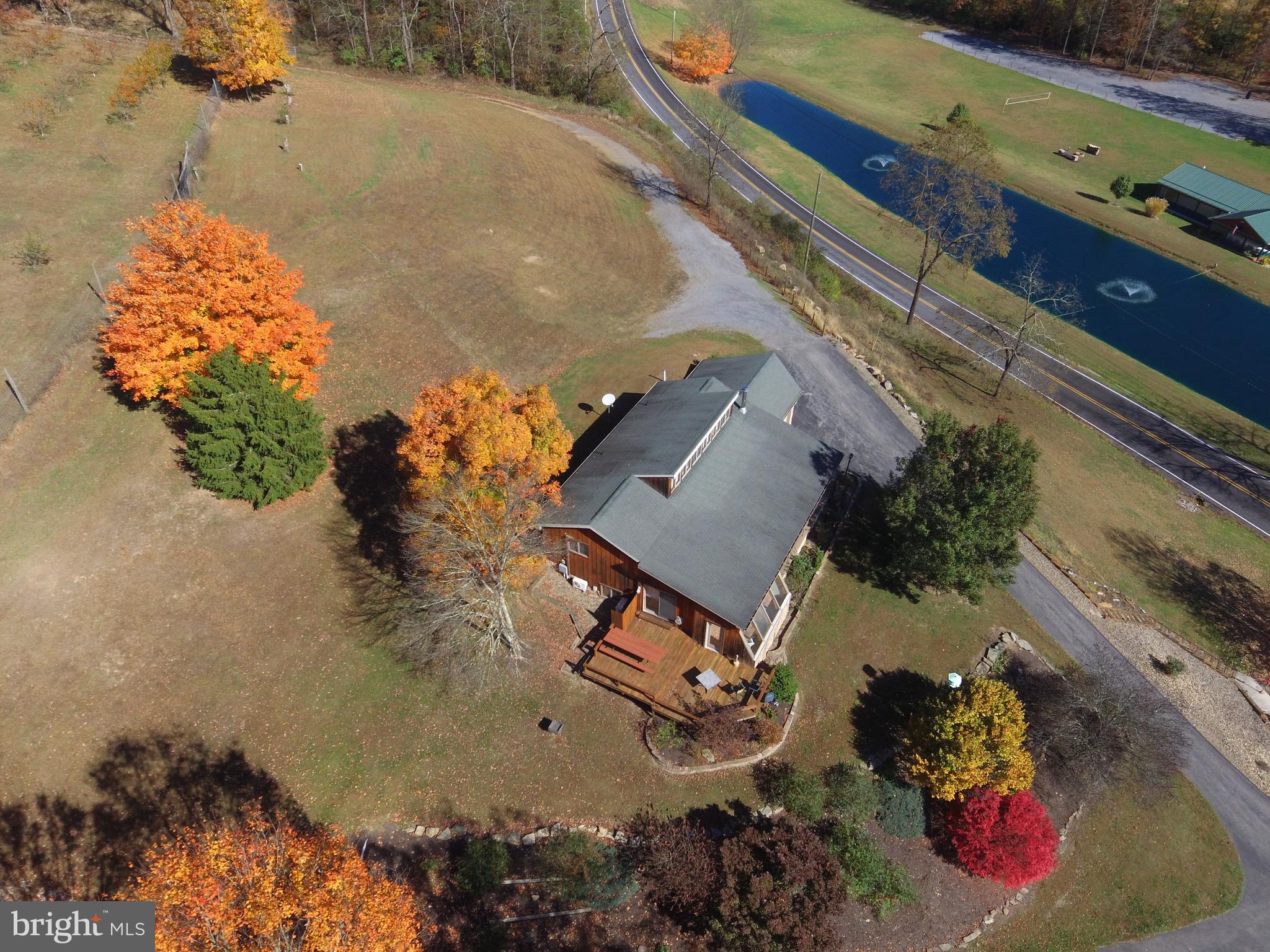 1461 Big Creek Road Clearville, PA 15535 - Photo 19 of 138 an aerial view of a house with a yard