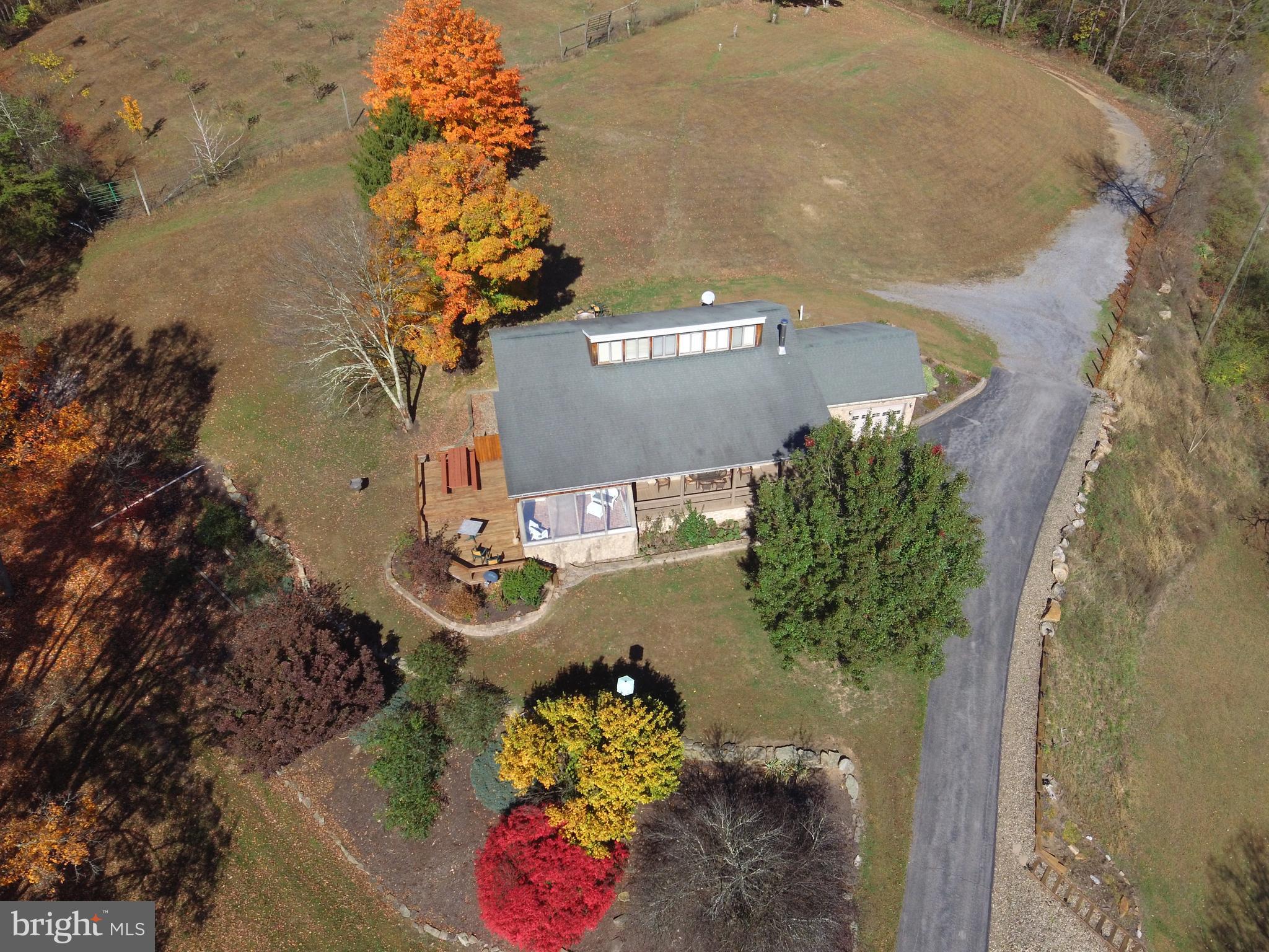 1461 Big Creek Road Clearville, PA 15535 - Photo 20 of 138 an aerial view of a house a yard and a fountain