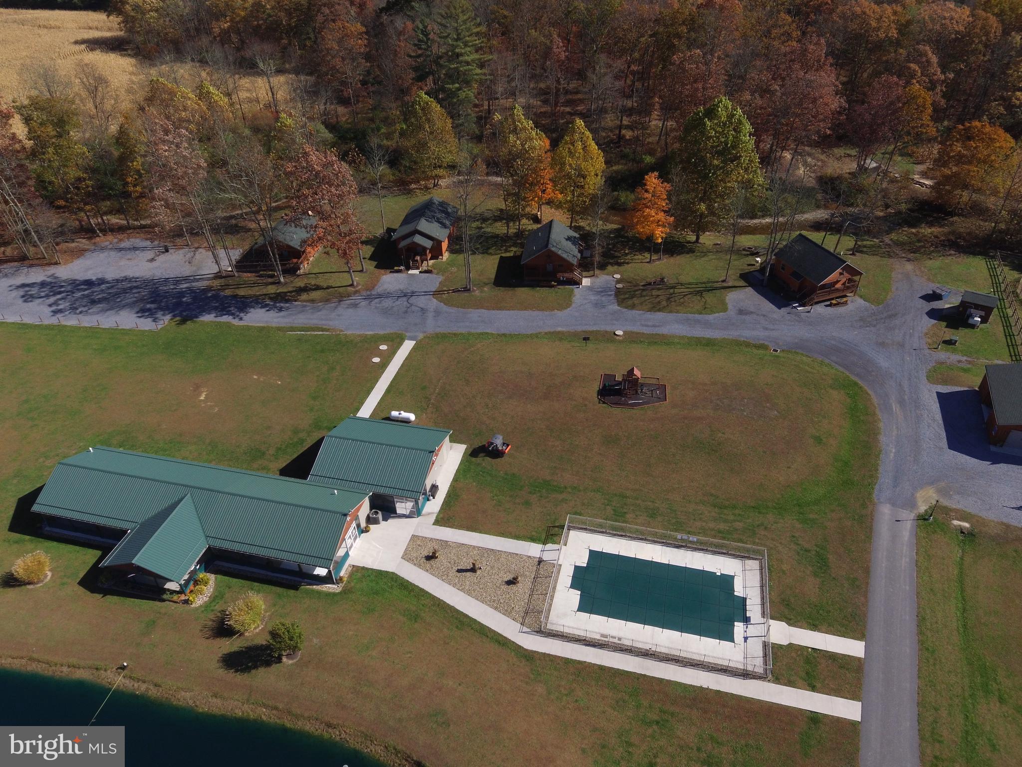 1461 Big Creek Road Clearville, PA 15535 - Photo 41 of 138 an aerial view of a house with a swimming pool