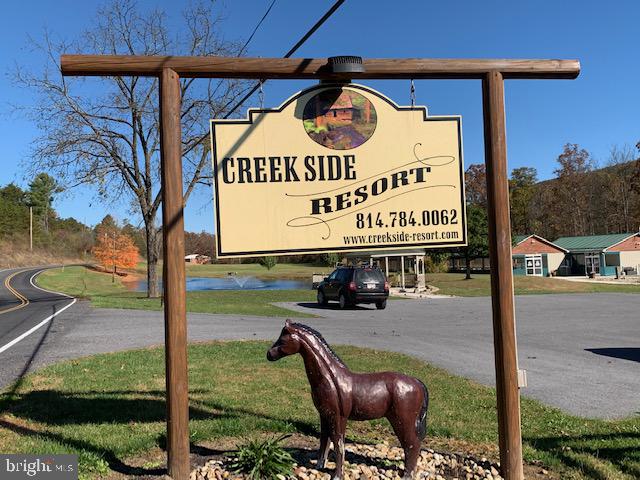 1461 Big Creek Road Clearville, PA 15535 - Photo 53 of 138 a sign on a pole on a street