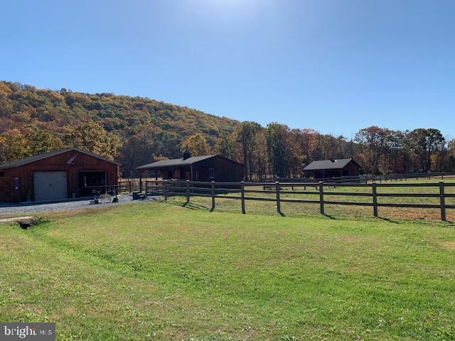 1461 Big Creek Road Clearville, PA 15535 - Photo 58 of 138 a view of a house with swimming pool and a yard