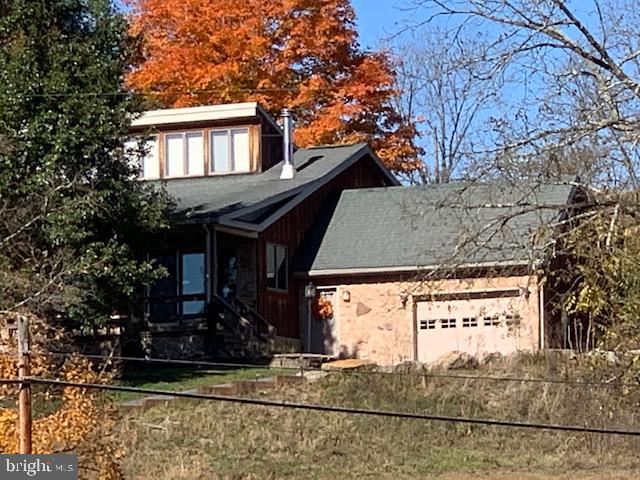 1461 Big Creek Road Clearville, PA 15535 - Photo 63 of 138 a view of house with a street