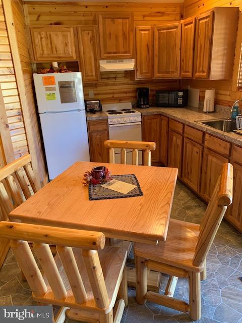 1461 Big Creek Road Clearville, PA 15535 - Photo 81 of 138 a view of a dining room with furniture and wooden floor