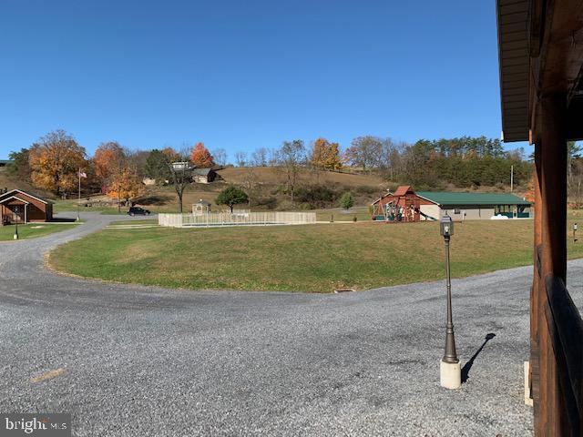 1461 Big Creek Road Clearville, PA 15535 - Photo 93 of 138 a view of a lake with a yard