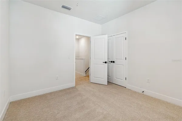 an empty room with an entryway
