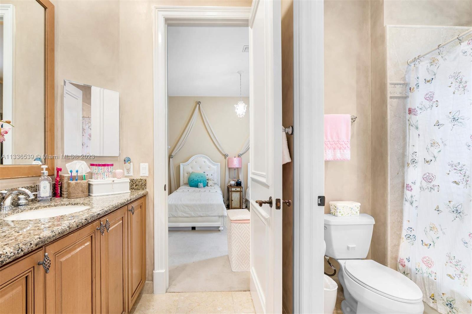 6911 Long Leaf Drive Parkland, FL 33076 - Photo 11 of 20 a bathroom with a granite countertop sink mirror vanity and toilet