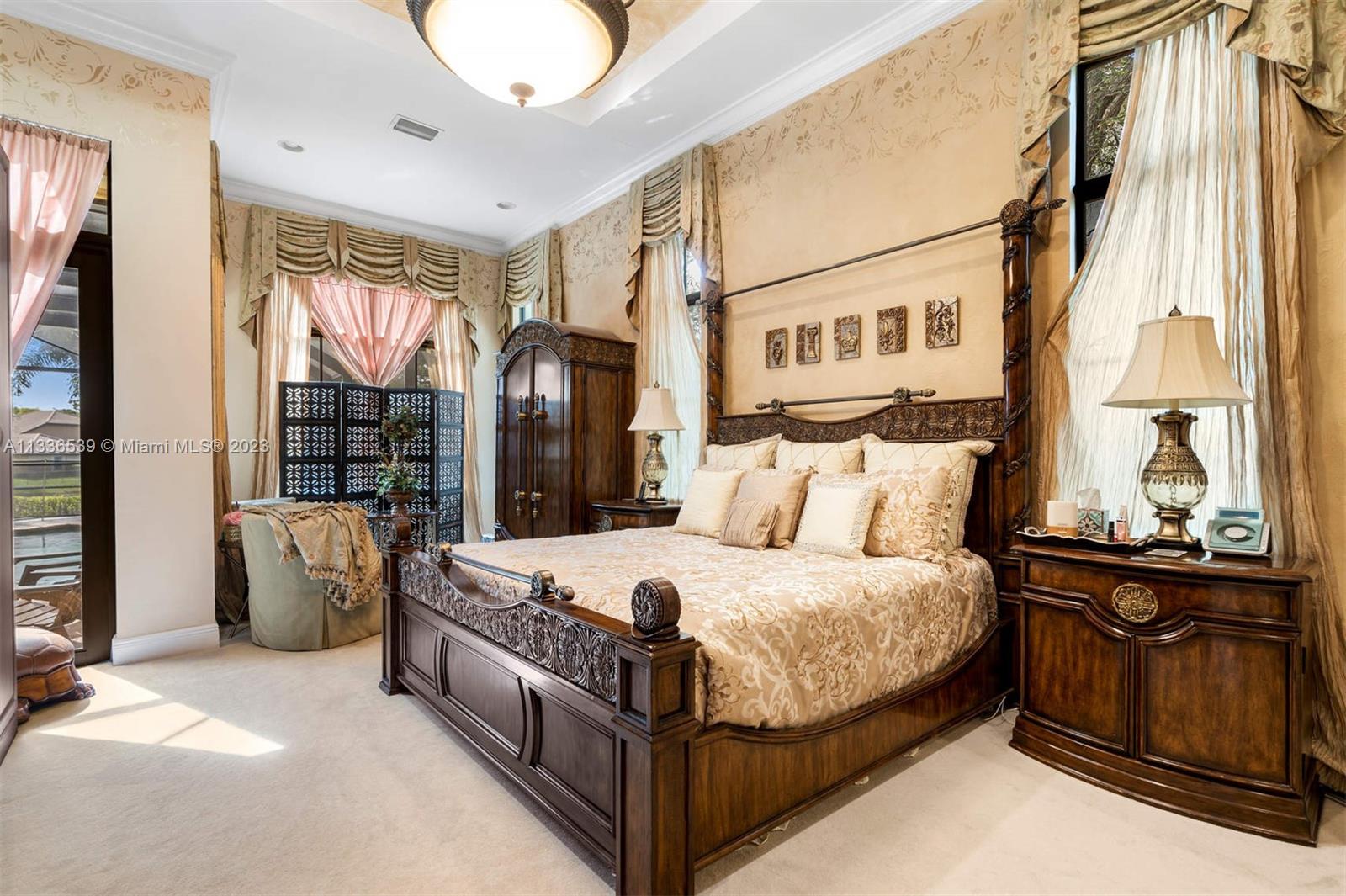 6911 Long Leaf Drive Parkland, FL 33076 - Photo 7 of 20 a bedroom with a bed and a couch