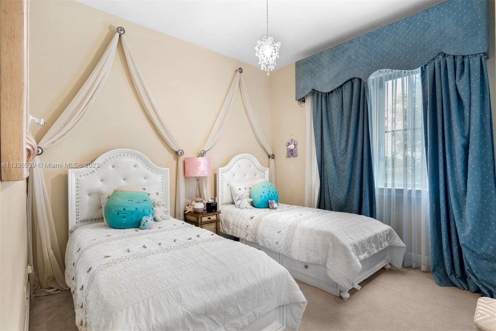 6911 Long Leaf Drive Parkland, FL 33076 - Photo 10 of 20 a bedroom with double bed and a window