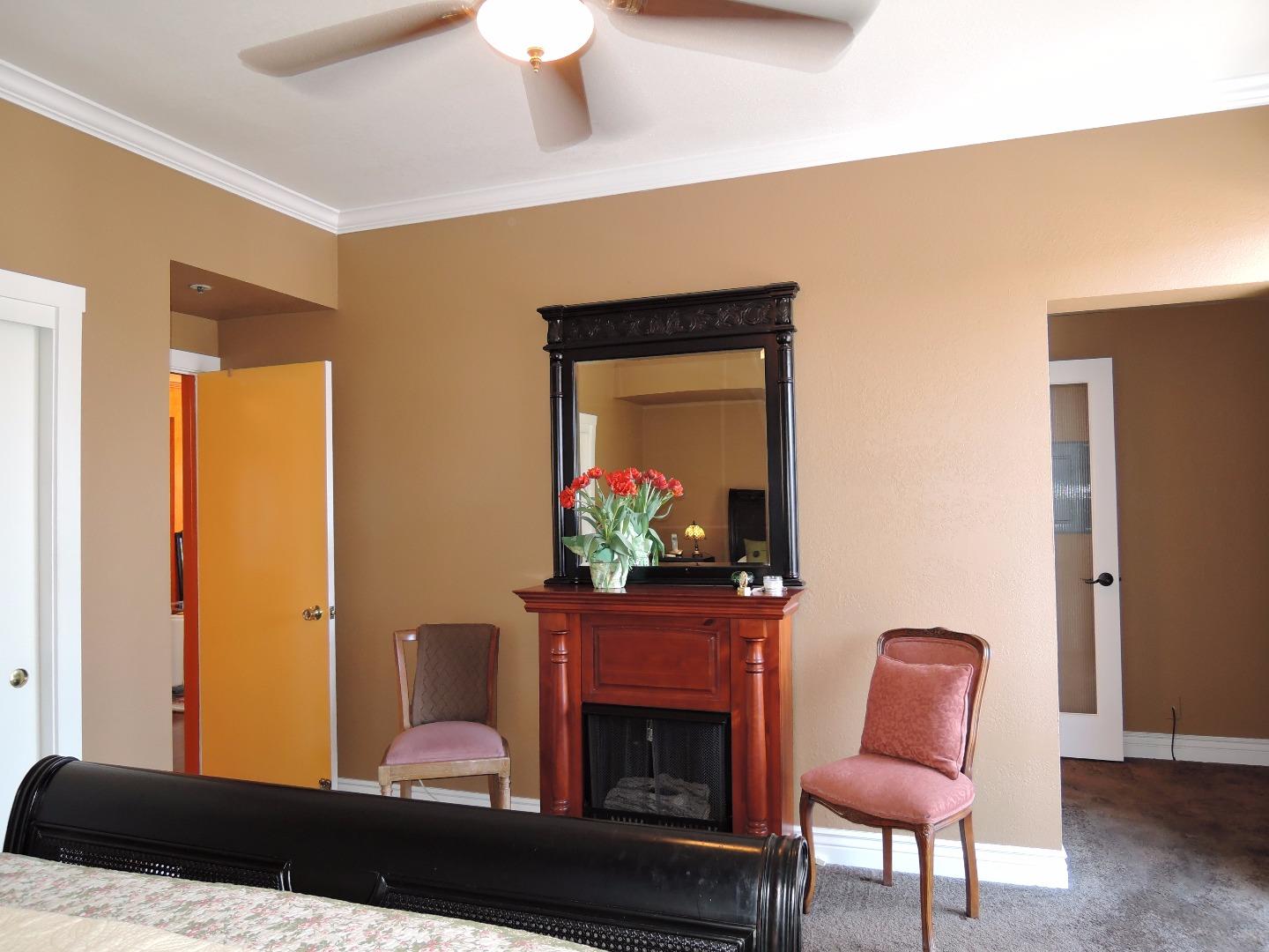 97 East St James Street, Unit 41 San Jose, CA 95112 - Photo 15 of 25 a living room with furniture and a fireplace