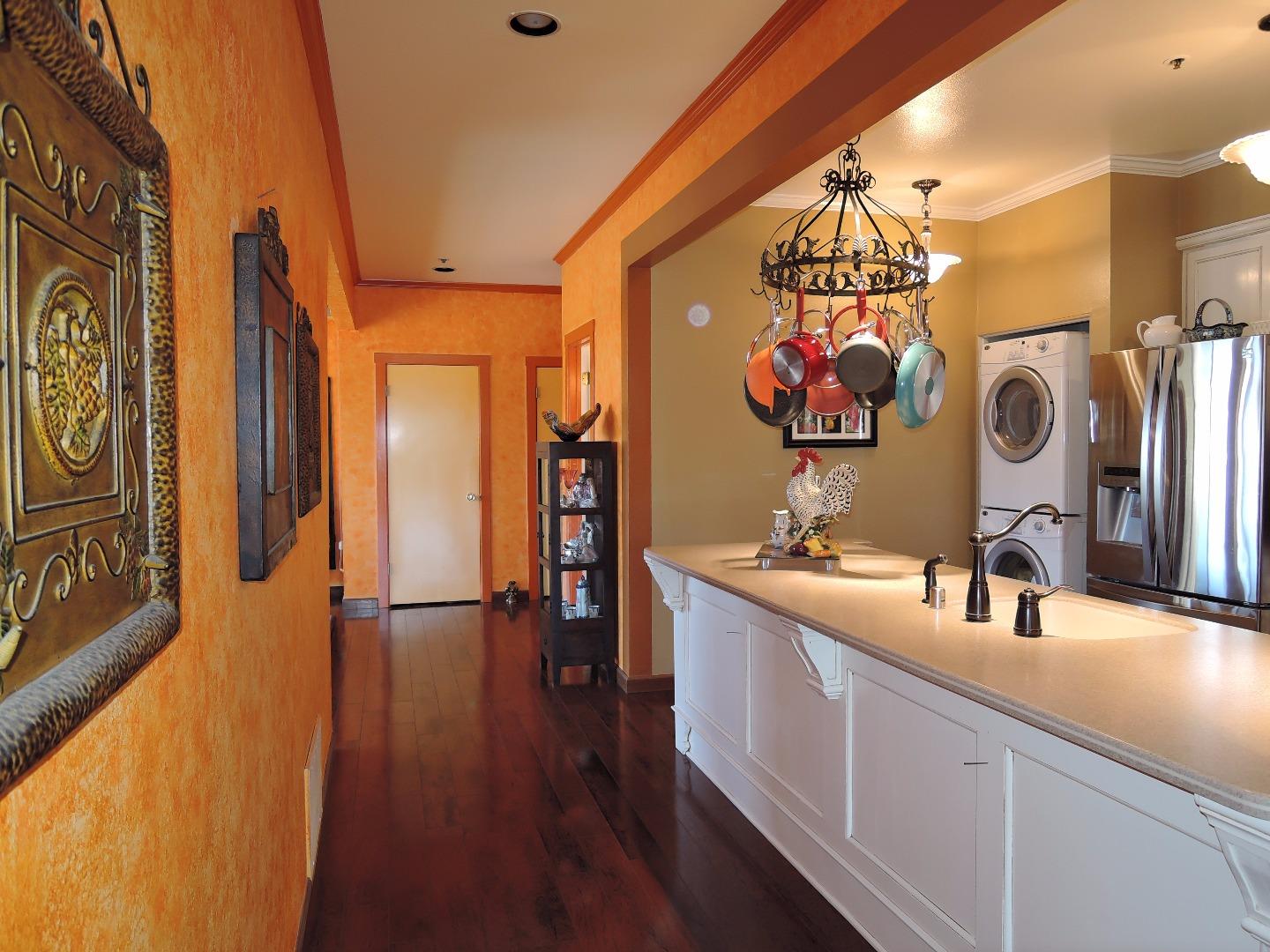 97 East St James Street, Unit 41 San Jose, CA 95112 - Photo 18 of 25 a kitchen with stainless steel appliances granite countertop a sink and cabinets
