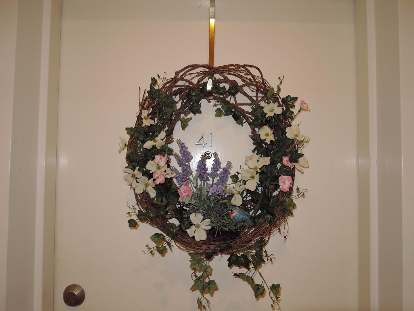 97 East St James Street, Unit 41 San Jose, CA 95112 - Photo 21 of 25 a vase of flowers sitting on a table