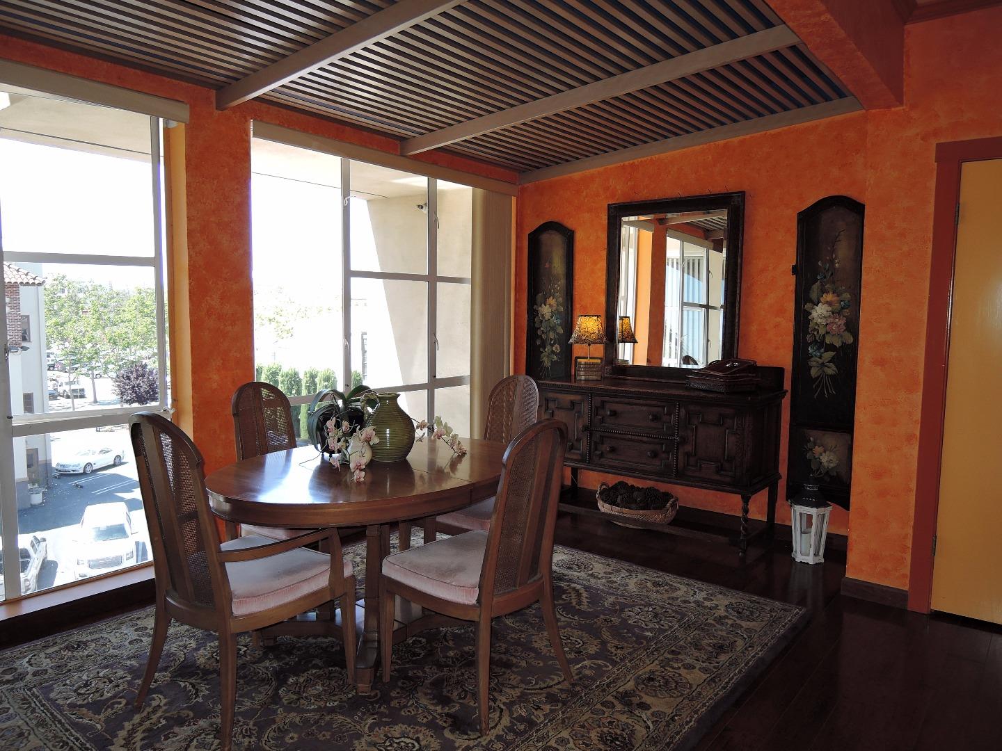97 East St James Street, Unit 41 San Jose, CA 95112 - Photo 4 of 25 a dining room with furniture and window