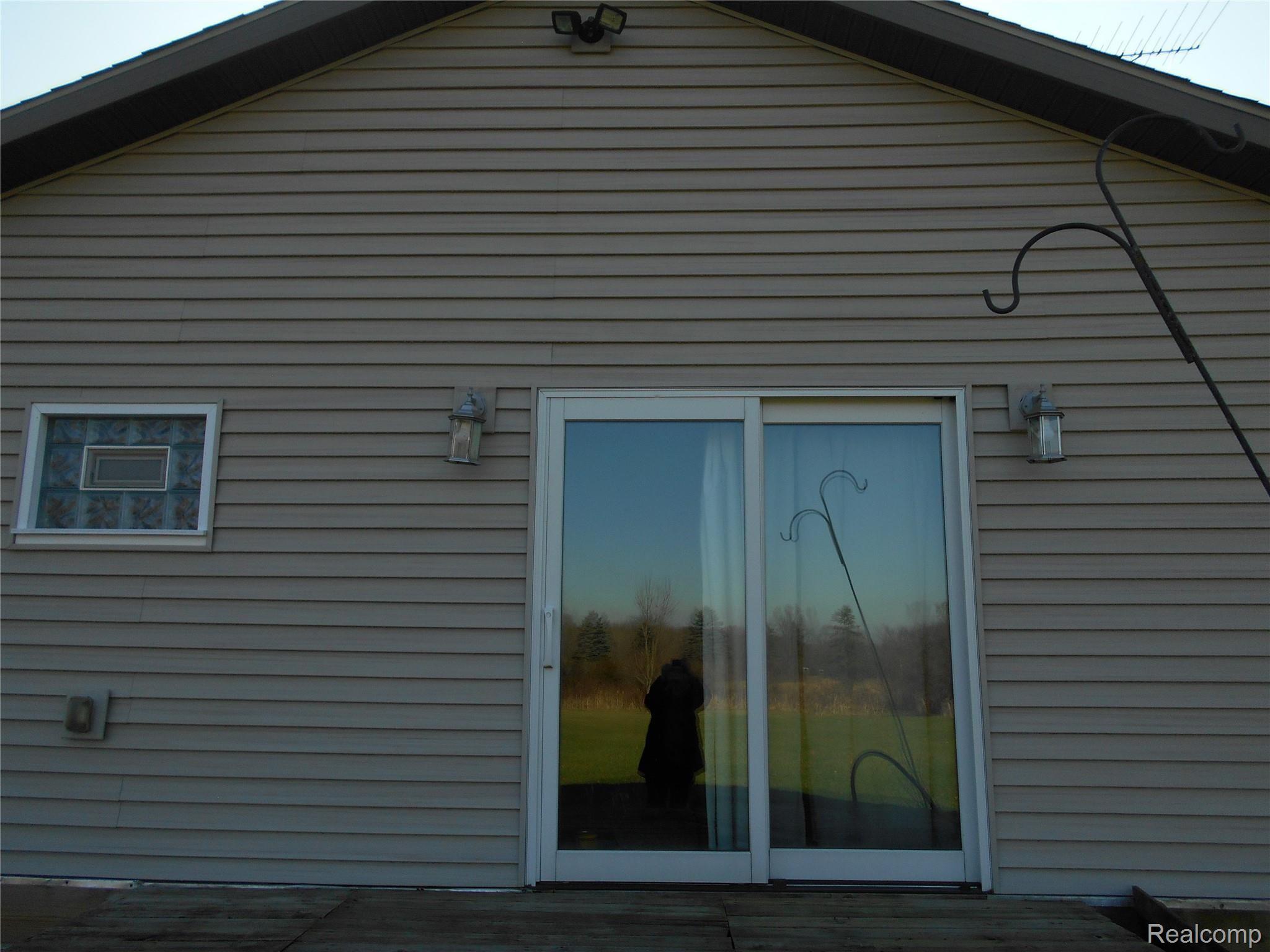 14440 West Howe Road Portland, MI 48875 - Photo 19 of 29 back View of House