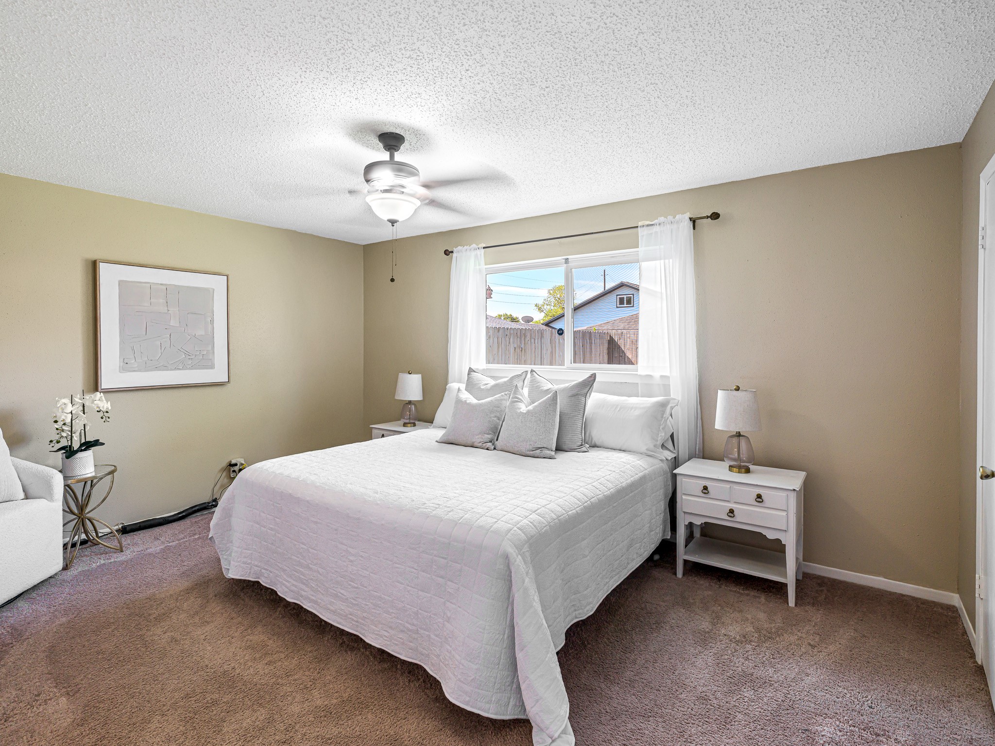 6230 Sunnygate Drive Spring, TX 77373 - Photo 17 of 33 Primary bedroom has lovely window and ceiling fan.