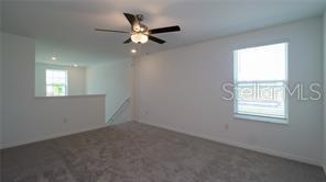 11142 Radiant Shr Loop San Antonio, FL 33576 - Photo 17 of 43 an empty room with a window