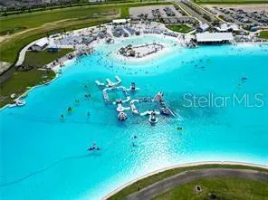 a view of a swimming pool with a garden