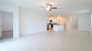 11142 Radiant Shr Loop San Antonio, FL 33576 - Photo 9 of 43 a view of an empty room with a window