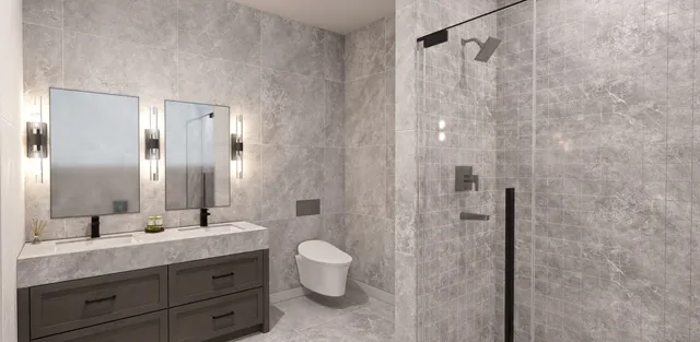 a bathroom with a double vanity sink mirror and shower
