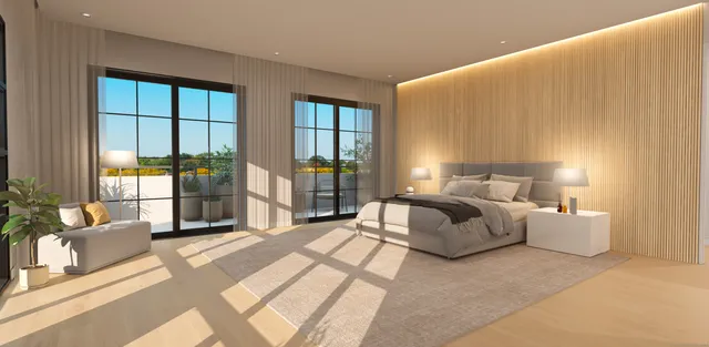 a spacious bedroom with a large bed and a large window