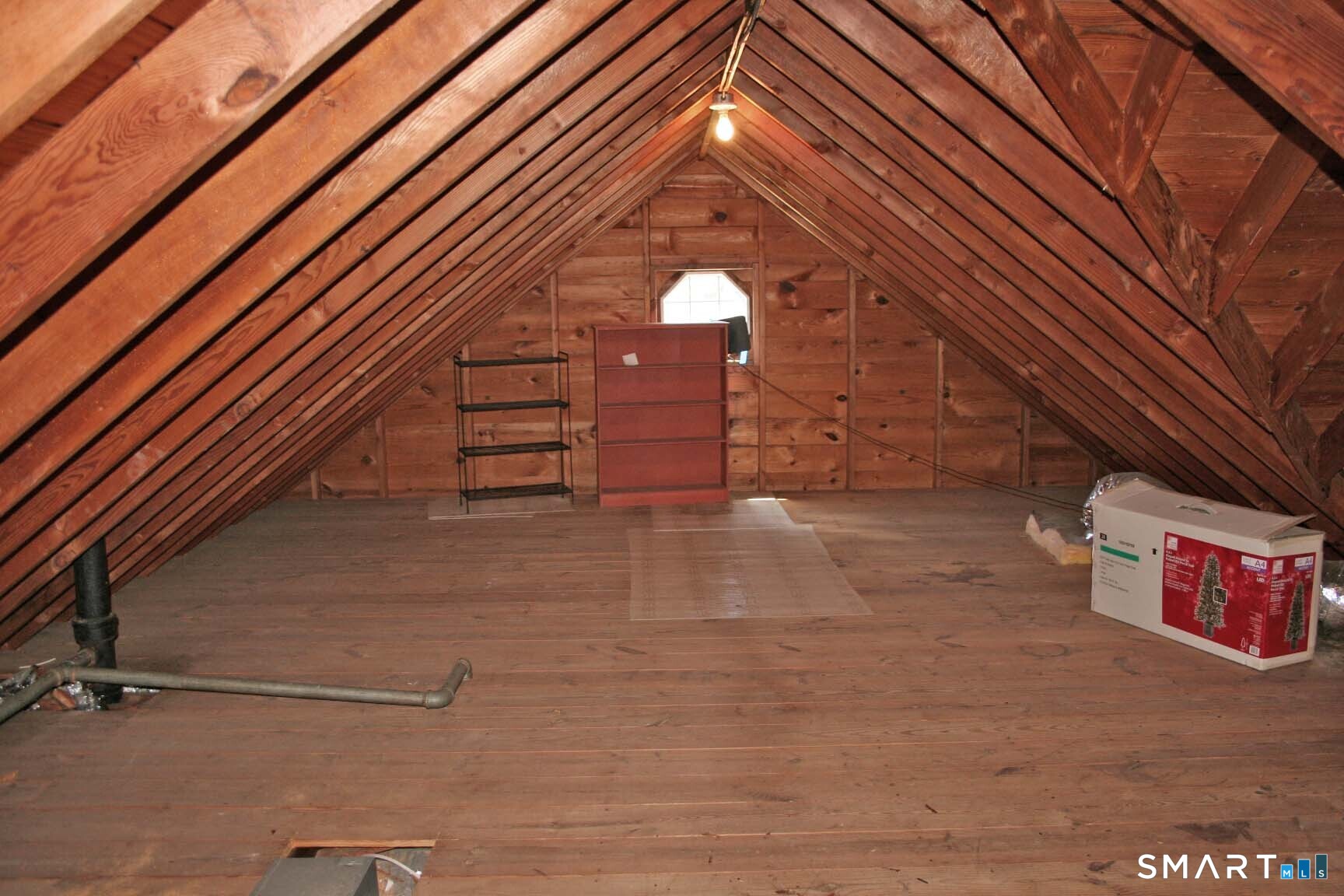 65 Prout Hill Road Middletown, CT 06457 - Photo 23 of 31 Right at the top of the house is this walk-up attic - perfect for storing seasonal decorations etc.