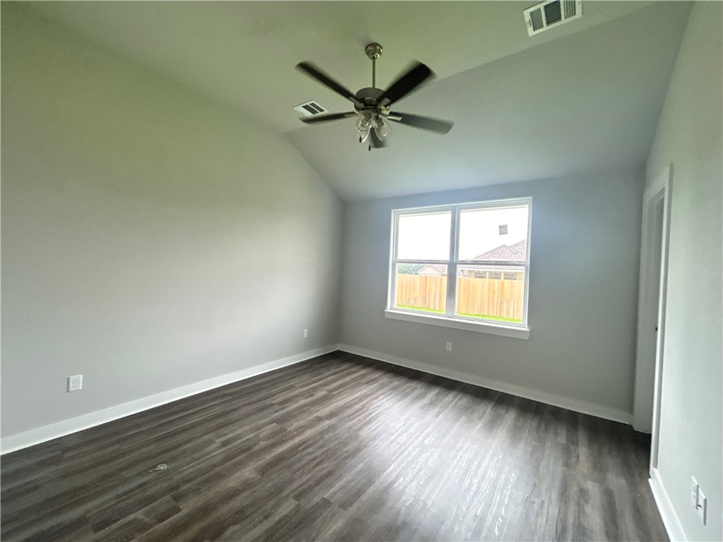 2791 Messenger Way Bryan, TX 77803 - Photo 5 of 15 wooden floor in an empty room with a window